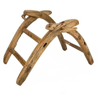 Lot 120 - A Continental fruitwood and olive donkey or mule rustic pack saddle.