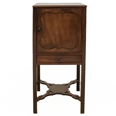 Lot 103 - A mahogany bedside cabinet.