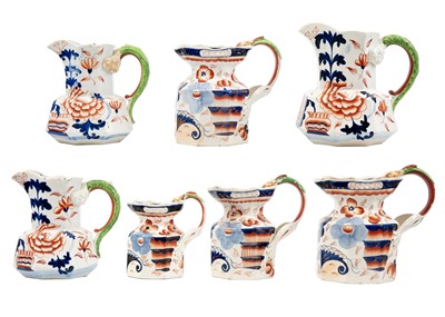 Lot 445 - A graduated set of four Ironstone china Hydra handle jugs.