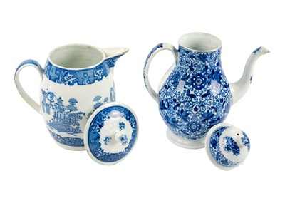 Lot 448 - A blue and white pearlware coffee pot and cover and a barrel-shaped jug and cover.