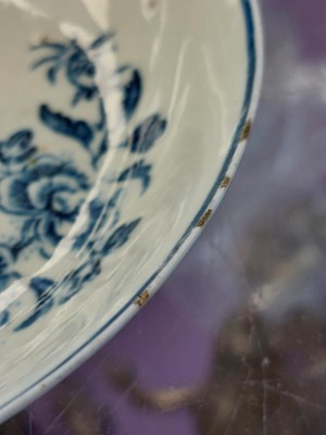 Lot 426 - An 18th century Liverpool porcelain blue and white tea bowl and saucer.