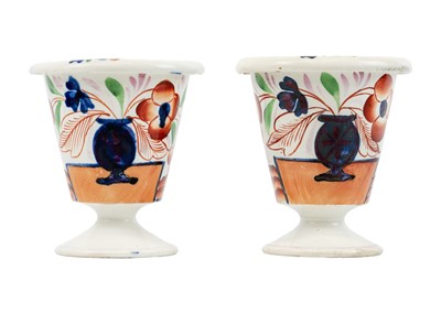 Lot 434 - Two mid Victorian terracotta classical design vases.