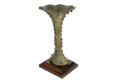 Lot 93 - A Chinese bronzed metal Gu vase.