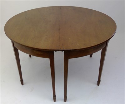 Lot 3437 - A George III mahogany D end dining table, with...