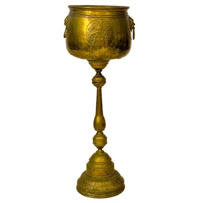 Lot 243 - A 20th century brass jardiniere on fixed pedestal stand.