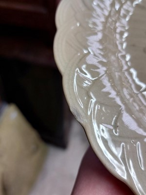 Lot 240 - A pair of Wedgwood Drabware sunflower moulded plates.