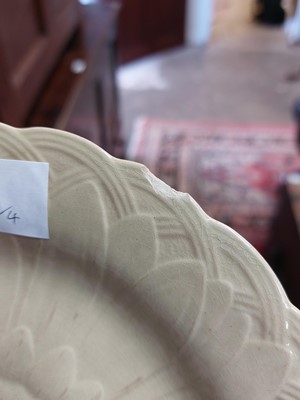 Lot 240 - A pair of Wedgwood Drabware sunflower moulded plates.