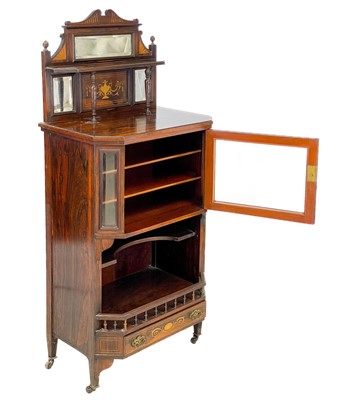 Lot 40 - An Edwardian rosewood inlaid music cabinet.