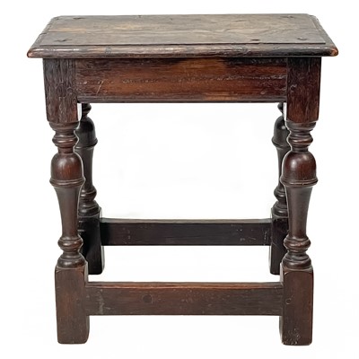 Lot 183 - An oak joint stool.