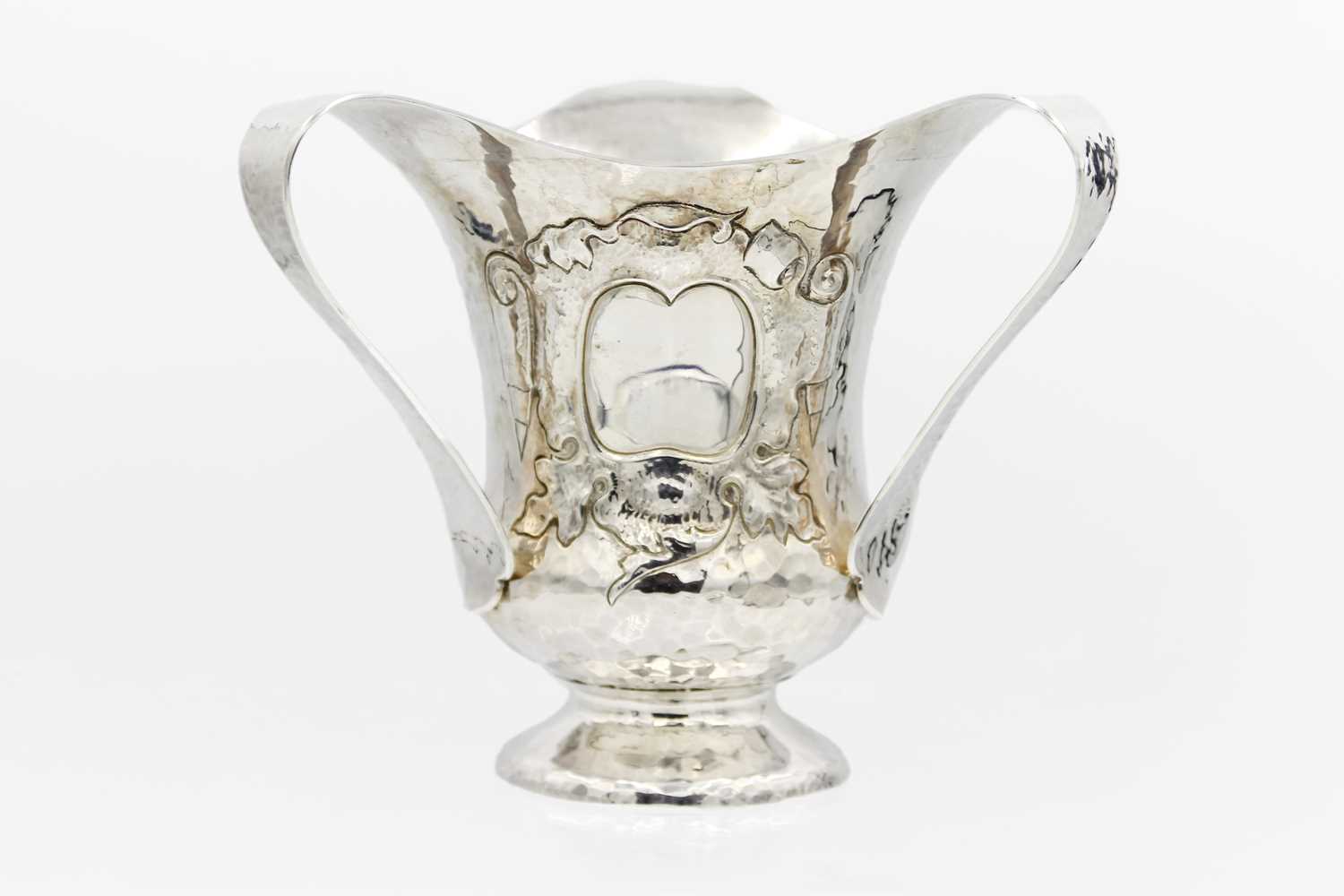 Lot 141 - An Arts & Crafts silver Tyg or Loving Cup by Thomas Edward Atkins.