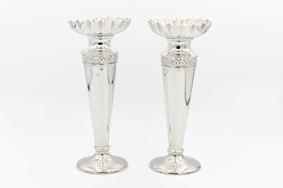 Lot 130 - A pair of Edwardian silver vases by S W Smith & Co.