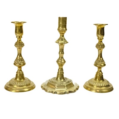 Lot 258 - An 18th century brass candlestick.