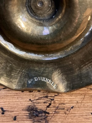 Lot 114 - An 18th century brass candlestick.