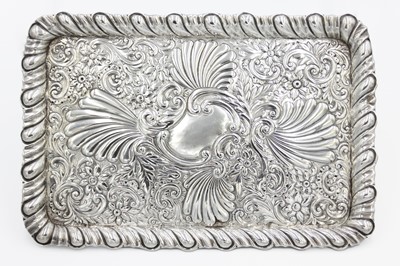 Lot 131 - An Edwardian silver dressing table tray by Henry Matthews.