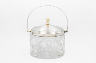 Lot 133 - A George VI Art Deco silver mounted cut glass biscuit barrel by C W Fletcher.