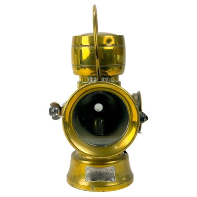 Lot 311 - A brass Lucas King of the Road lamp.