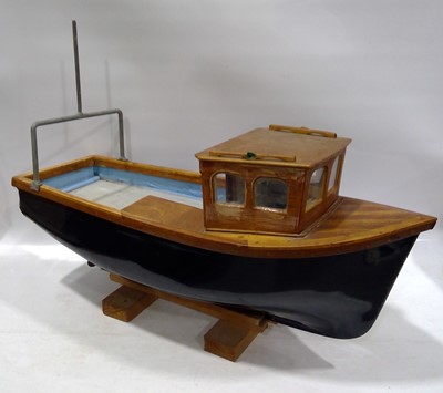 Lot 18 - A Model of a Fishing Boat in Fiberglass with