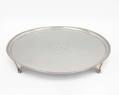 Lot 140 - A George III silver circular salver by Elizabeth Jones.