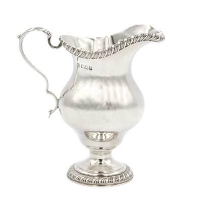 Lot 138 - A heavy modern silver pedestal cream jug by Richard Comyns.