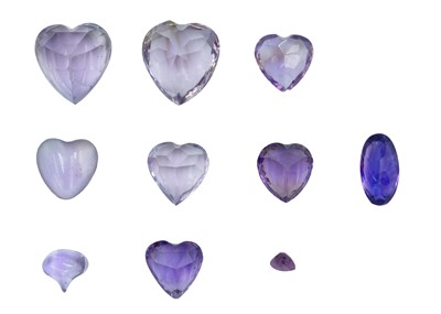 Lot 298 - Eight amethyst cut heart loose stones.