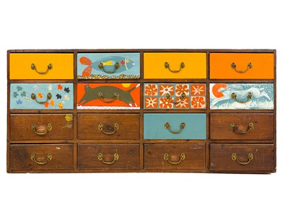 Lot 26 - A bank of 16 late Victorian stained and later painted pine drawers.