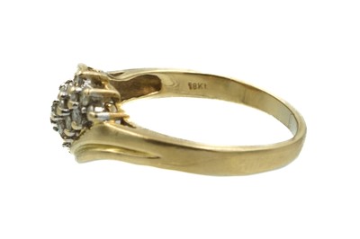 Lot 3 - An 18ct and diamond modern dress ring.