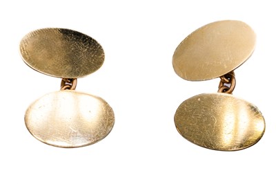 Lot 5 - A 9ct pair of plain oval cuff links by Walker & Hall.