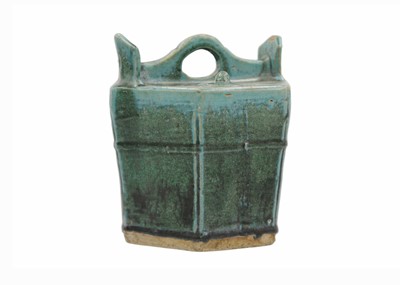 Lot 43 - A Chinese Shiwan pottery green-glazed teapot, 19th century.