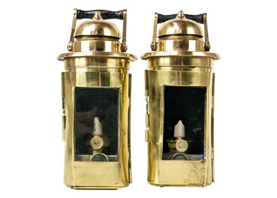 Lot 135 - A pair of early 20th century brass ship binnacles.