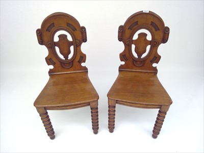 Lot 3415 - A pair of Victorian oak hall chairs, with...