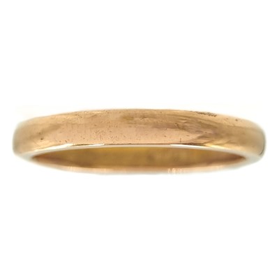 Lot 11 - A 22ct hallmarked gold band ring.
