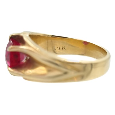 Lot 13 - A 14ct synthetic ruby set ring.