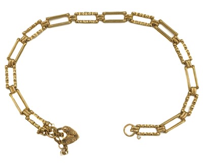 Lot 18 - A 9ct two bar gate bracelet with padlock clasp.