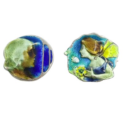 Lot 24 - Two Art Nouveau silver and enamel brooches.