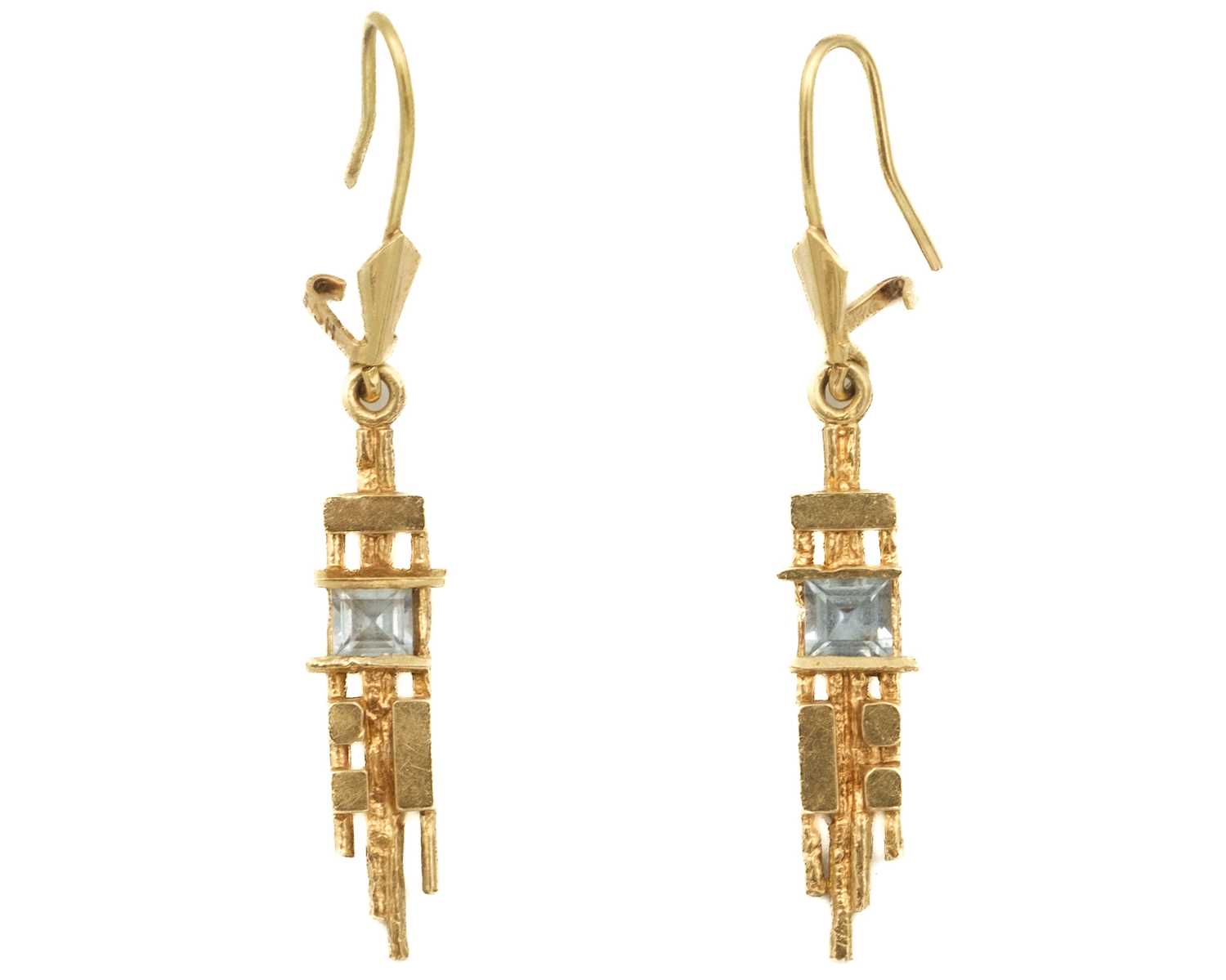 Lot 25 - A 14ct and aquamarine set pair of Modernist pendant earrings.