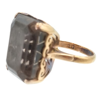Lot 29 - A 9ct smoky quartz set cocktail ring.