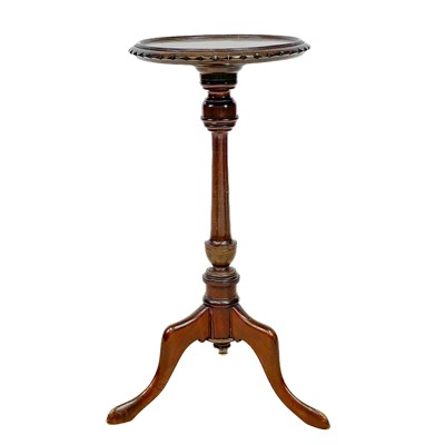 Lot 47 - A George III style mahogany candle stand.