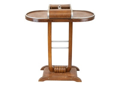 Lot 605 - An Art Deco walnut occasional table.