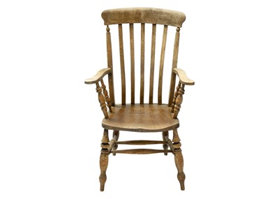 Lot 1254 - A late Victorian lath back beech and elm kitchen Windsor chair.