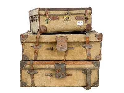 Lot 102 - Two early 20th century canvas trunks by Finnigan Manchester