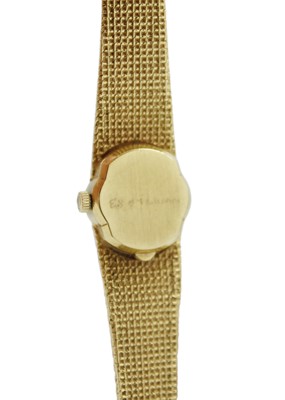 Lot 142 - OMEGA - An 18ct lady's bracelet quartz wristwatch with replacement quartz movement.