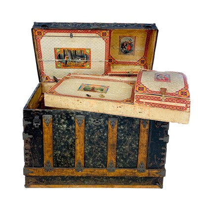 Lot 128 - A Victorian domed topped trunk.