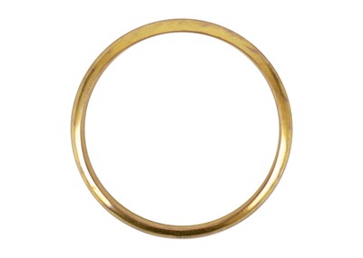 Lot 58 - A 9ct hollow gold bangle.