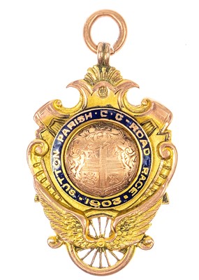Lot 77 - An Edwardian 15ct rose gold and enamel shield watch chain fob.