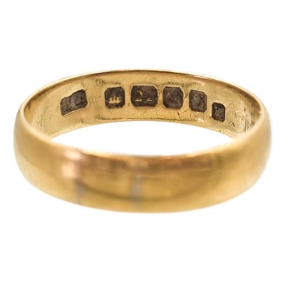 Lot 27 - A 22ct hallmarked gold band ring.