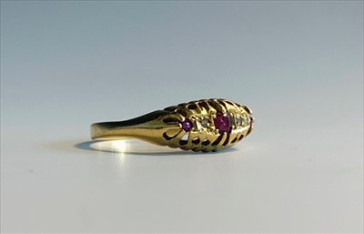 Lot 2575 - An 18ct Victorian style ring set with three...