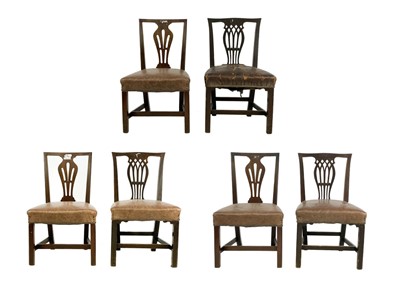 Lot 87 - A set of six George III provincial mahogany dining chairs.