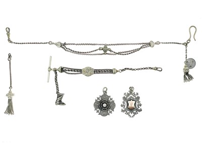 Lot 69 - Two low grade silver Albertine pocket watch chains and two silver fobs.