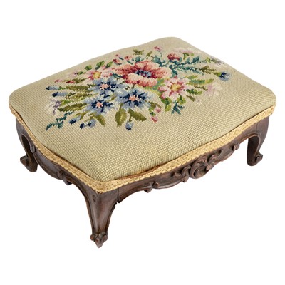 Lot 63 - A small 19th century carved walnut woolwork footstool.