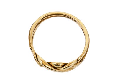 Lot 96 - An 18ct four piece puzzle ring of knot design.